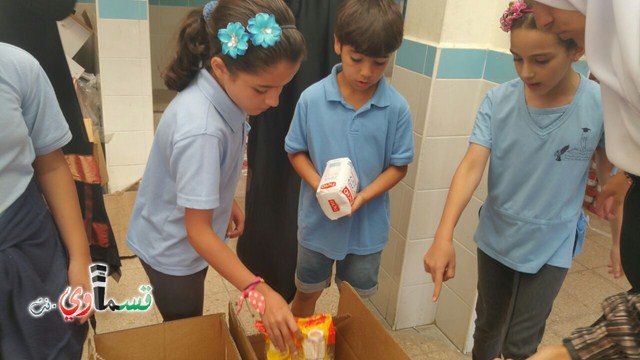 طلاب مدرسة جنة ابن رشد يوزعون الطرود الغذائية للعائلات المحتاجة مع نفحات شهر رمضان المبارك  